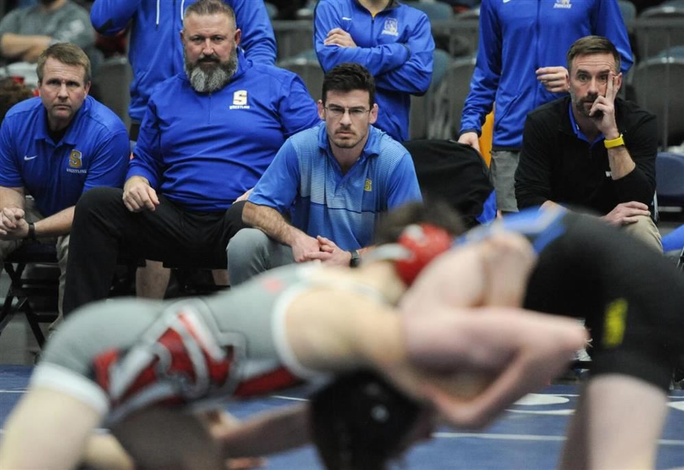  Ethan Kyle watching a wrestling match